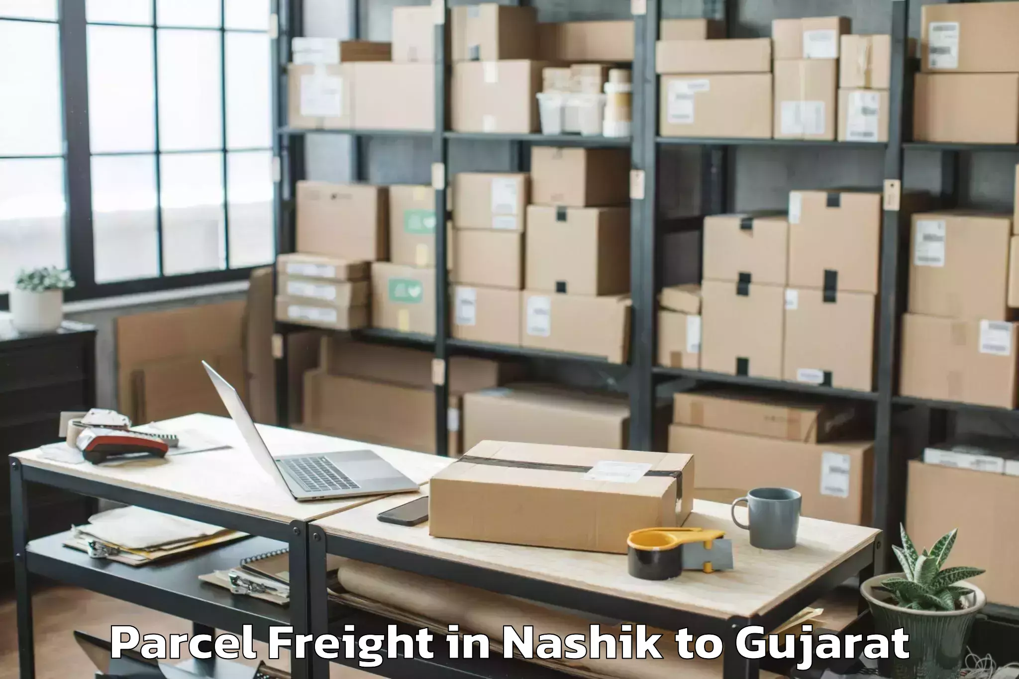 Book Your Nashik to Khambhaliya Parcel Freight Today